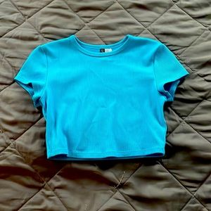 A blue crop top